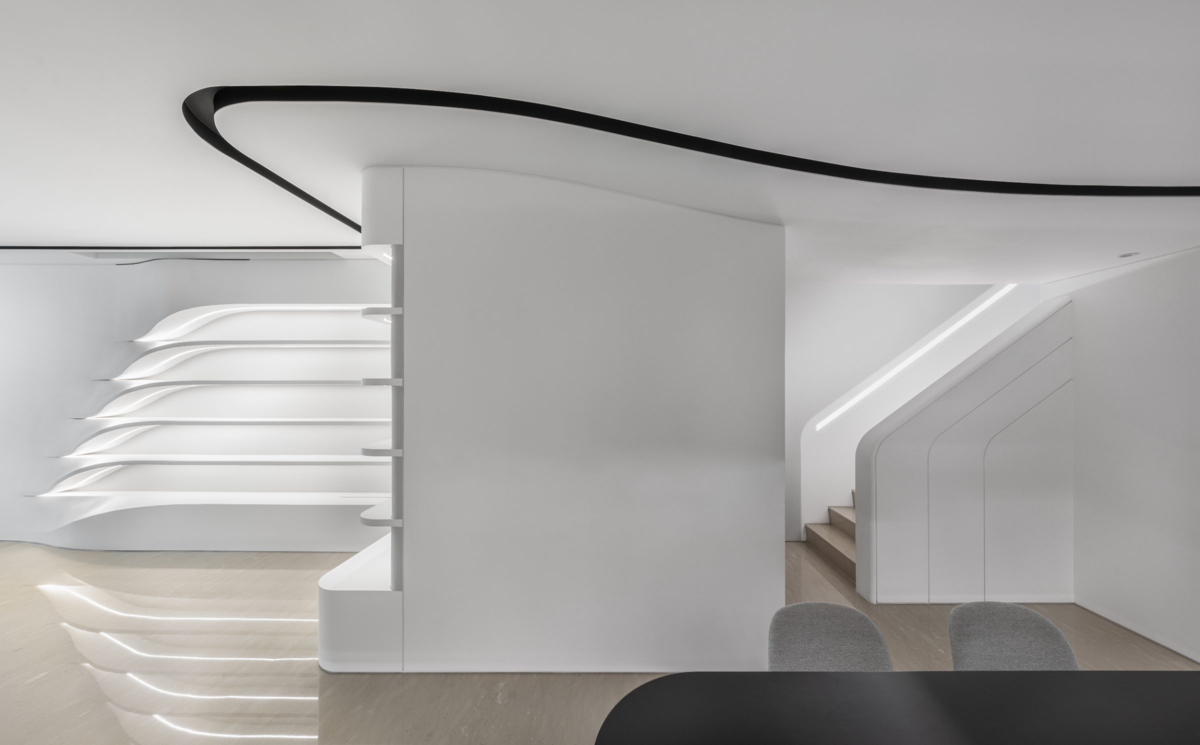 Residence interior — continuous oak and plaster surface
